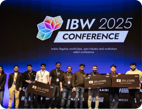 Demo Day participants holding awards on stage at India Blockchain Week 2025