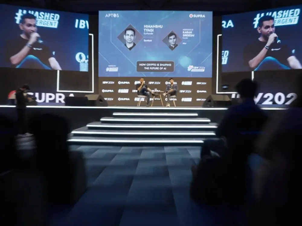 The main stage at IBW2024, with a fireside chat on the screens above it